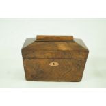 A Victorian rosewood tea caddy of sarcophagus form, 16cm high, 22cm wide,