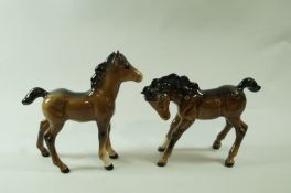 Two glass Beswick bay foals, each with black printed marks, Beswick,