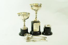 A matched pair of small silver trophy cups; and three silver golfing spoons; 197 g (6.