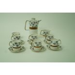 A 20th century Crown Devon coffee set, comprising coffee pot, six cups and saucers,