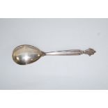 A Georg Jensen acanthus pattern spoon, 1933-44 monogram, 15 cm long, 35.