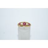 A five stone ruby and diamond ring, circa 1900,