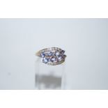 A tanzanite and diamond dress ring, unmarked,