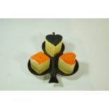 A Carlton Ware cruet set in the deck of cards pattern, printed factory marks in black, 6cm high,