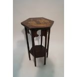 An interesting 20th century octagonal stained beech table the top with pen work cavalry mounted