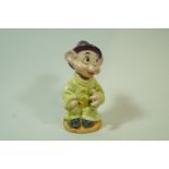 A Beswick Snow White and the Seven Dwarfs figure of Dopey, gold back stamp,