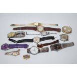 A collection of thirteen gents and ladies wrist watches,