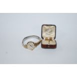 A lady's 9 carat gold Golay wrist watch on a gilt expending bracelet;