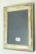 A modern silver photo frame, Sheffield 1995,