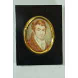 English School, Portrait miniature of a gentleman facing right in a brown coat, watercolour,