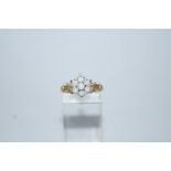 A five stone opal 9 carat gold cluster ring, finger size O, 1.