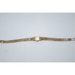 Rotary, a lady's 9 carat gold bracelet watch, 18 cm long,