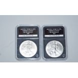 Two uncirculated American Eagle silver dollars, 2008 & 2013,