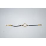 Tudor, A lady's 9 carat gold round wrist watch, circa 1987,