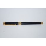 A black Mont Blanc Noblesse fountain pen,