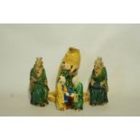 A pair of Chinese mudman figures, 12cm high,