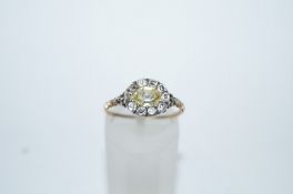 A George III yellow diamond ring, circa 1780, the oval cut tinted stone measuring approximately 6.