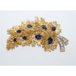 A 1960s diamond and sapphire spray brooch,