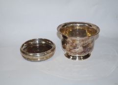 A modern silver wine coaster, London 1971, the plain rim to a turned wooden base, 13.