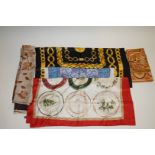 A collection of five silk scarves,
