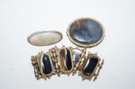 A  Victorian gilt metal agate mounted bracelet, with a gilt metal agate panel brooch,