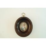 A portrait miniature of a young man, in 18th century style, watercolour on ivory,