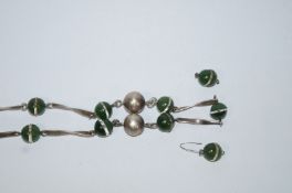 A silver and nephrite necklace,