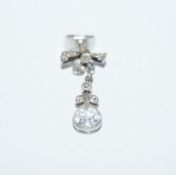 A single diamond drop earring, the pendeloque stone estimated as weighing approximately 0.