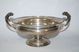 A two handled silver bowl, Barker Brothers and Sons Ltd, Birmingham 1929, with flying mask handles,