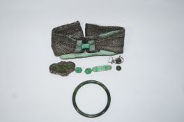 A jade dress clip,