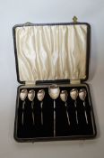 A set of six silver coffee spoons and sugar spoon, London 1972, larger spoon by C. J.