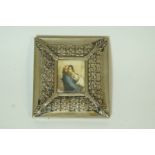 An overpainted print of a mother and child in a continental white metal frame marked 800, 8.