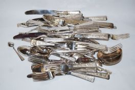 A Vietnamese white metal part table service, including some loaded handled knives, 2270g (73.