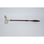 A Brian Fuller silver rabbit candle snuffer, London 1979, on a turned wooden handle,