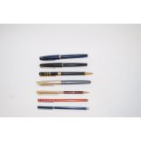 Four Sheaffer fountain pens, two with 14k nibs,