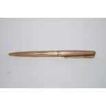 A 9 carat Parker pen, with engine turned decoration,
