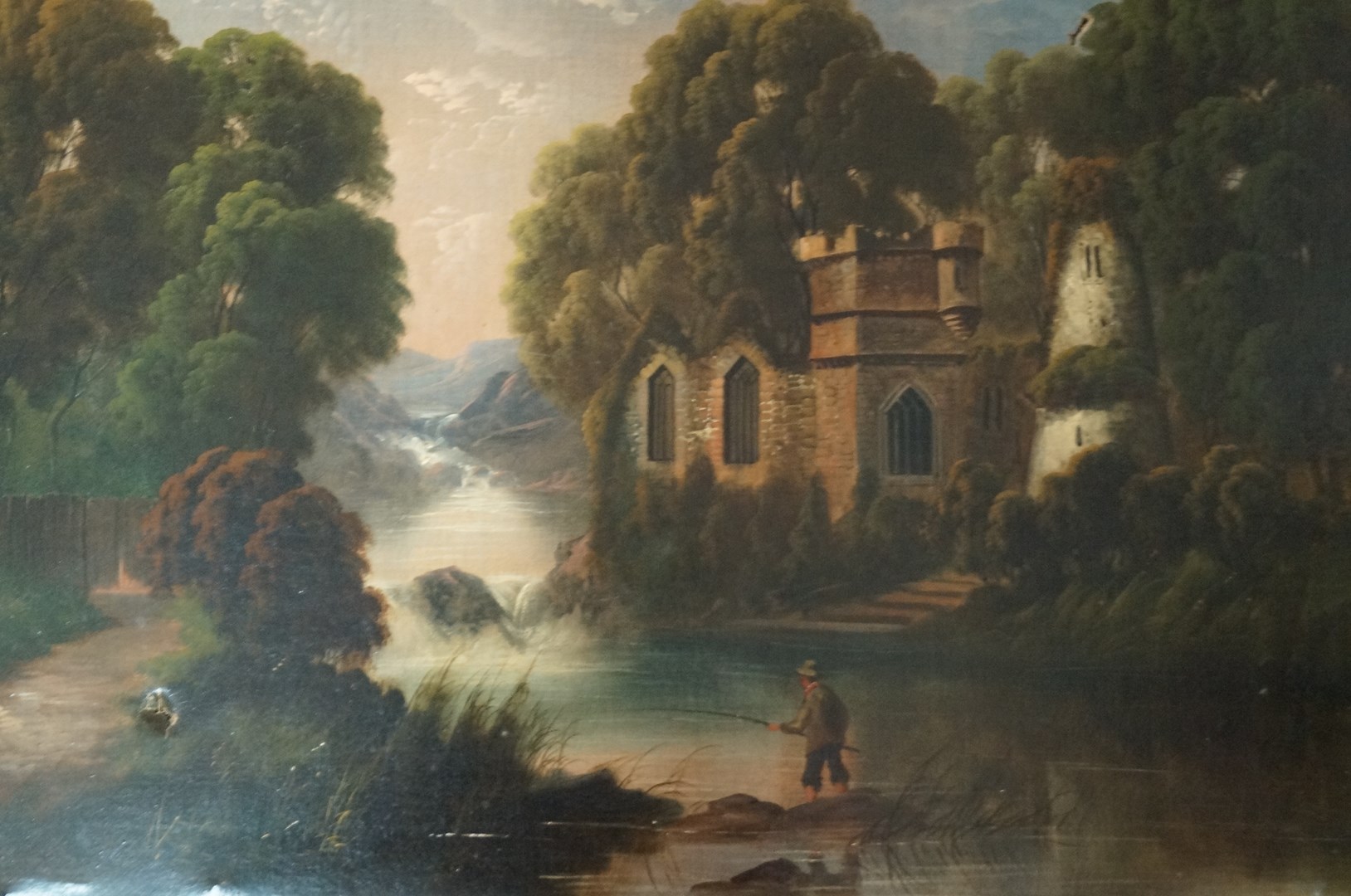 English School, 19th century
Figure fishing in a river landscape with ruins beyond
Oil on canvas
51.