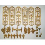 A set of six gilded pierced door finger plates and a quantity of other door furniture