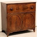 A George III mahogany secretaire, decora