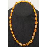 An amber necklace with screw fitting