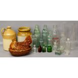A collection of glass bottles, lamp chim