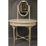 An ivory lacquered dressing table of Reg