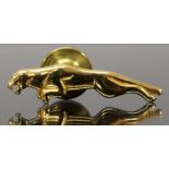 A 9ct gold jaguar pin brooch.