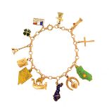 Enamel, Yellow Gold Charm Bracelet. The 14k yellow gold 7 inch bar link chain features twelve