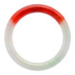 Jade Bracelet. The carved jadeite bangle measuring approximately 11.00 mm in width with an