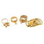 Collection of Diamond, Yellow Gold Rings. Including one Cartier diamond, 18k yellow and white gold