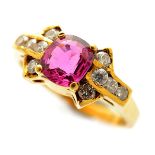 Ruby, Diamond, 18k Yellow Gold Ring. Centering one oval-cut ruby weighing approximately 0.70 ct.,