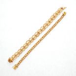 Collection of Two 14k Yellow Gold Bracelets. Including one 14k yellow gold leaf motif 7 inch
