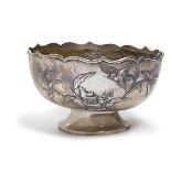 A Chinese Export Silver Punch Bowl Circular form with wavy-edge rim, the bowl applied with a bird