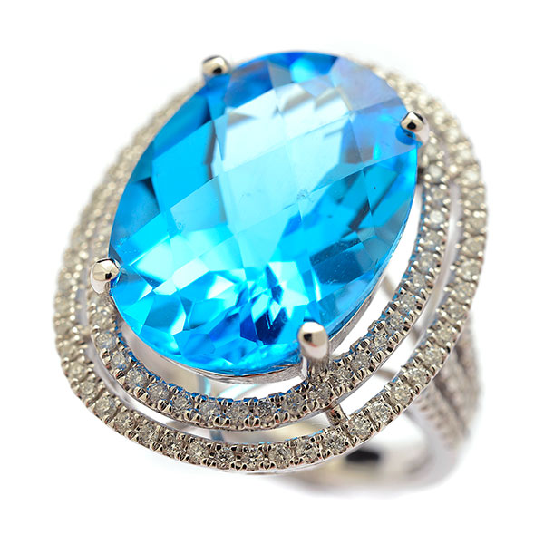 Blue Topaz, Diamond, 14k White Gold Ring. Centering one oval-cut blue topaz weighing approximately